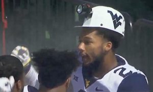 West Virginia joins turnover prop trend with coal miner's helmet